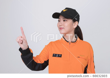 Asian male and female firefighter portrait, young smiling fireman in uniform 199 Asian male and female firefighter portrait, young smiling fireman in uniform 199 66632803