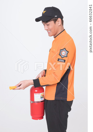Asian male and female firefighter portrait, young smiling fireman in uniform 131 Asian male and female firefighter portrait, young smiling fireman in uniform 131 66632841