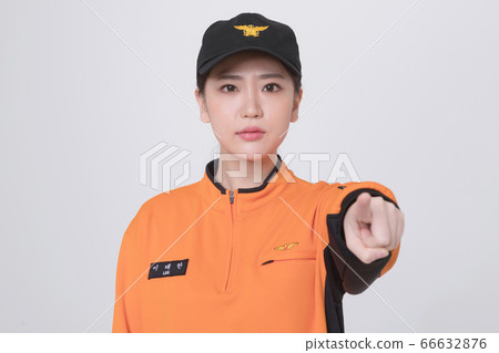 Asian male and female firefighter portrait, young smiling fireman in uniform 253 66632876