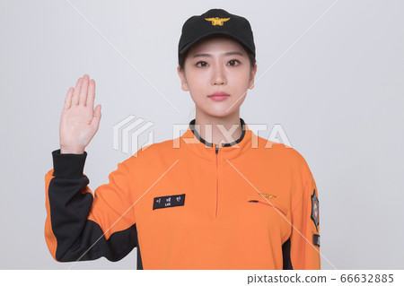 Asian male and female firefighter portrait, young smiling fireman in uniform 244 Asian male and female firefighter portrait, young smiling fireman in uniform 244 66632885