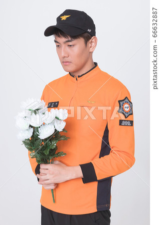 Asian male and female firefighter portrait, young smiling fireman in uniform 091 Asian male and female firefighter portrait, young smiling fireman in uniform 091 66632887
