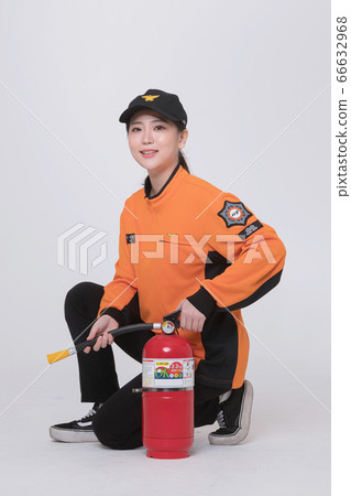 Asian male and female firefighter portrait, young smiling fireman in uniform 245 Asian male and female firefighter portrait, young smiling fireman in uniform 245 66632968