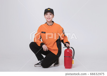 Asian male and female firefighter portrait, young smiling fireman in uniform 207 66632975