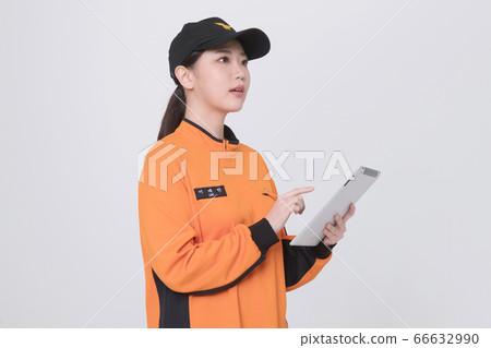 Asian male and female firefighter portrait, young smiling fireman in uniform 221 Asian male and female firefighter portrait, young smiling fireman in uniform 221 66632990