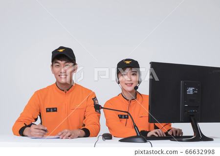 Asian male and female firefighter portrait, young smiling fireman in uniform 224 Asian male and female firefighter portrait, young smiling fireman in uniform 224 66632998