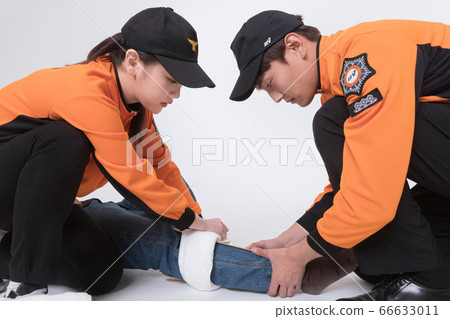 Asian male and female firefighter portrait, young smiling fireman in uniform 183 Asian male and female firefighter portrait, young smiling fireman in uniform 183 66633011