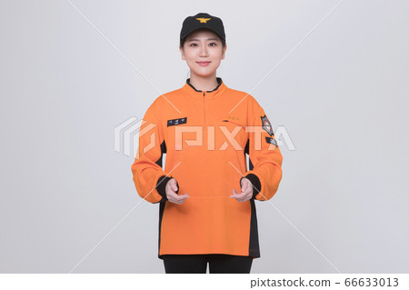 Asian male and female firefighter portrait, young smiling fireman in uniform 188 Asian male and female firefighter portrait, young smiling fireman in uniform 188 66633013