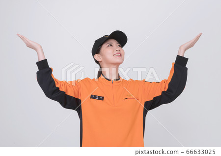 Asian male and female firefighter portrait, young smiling fireman in uniform 159 Asian male and female firefighter portrait, young smiling fireman in uniform 159 66633025