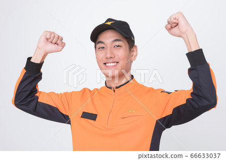 Asian male and female firefighter portrait, young smiling fireman in uniform 003 66633037