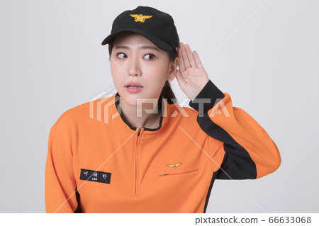 Asian male and female firefighter portrait, young smiling fireman in uniform 142 Asian male and female firefighter portrait, young smiling fireman in uniform 142 66633068