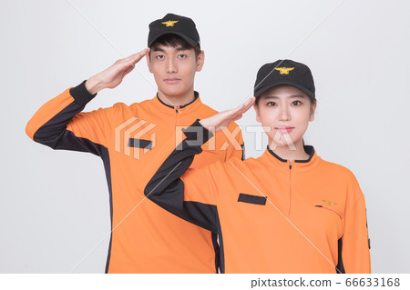 Asian male and female firefighter portrait, young smiling fireman in uniform 060 Asian male and female firefighter portrait, young smiling fireman in uniform 060 66633168