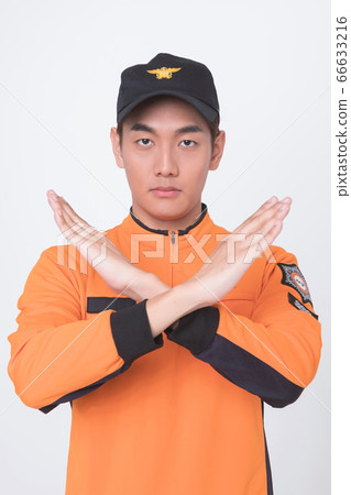 Asian male and female firefighter portrait, young smiling fireman in uniform 002 Asian male and female firefighter portrait, young smiling fireman in uniform 002 66633216