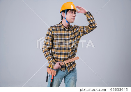 A studio portrait of Asian man making a confident smile 395 66633645