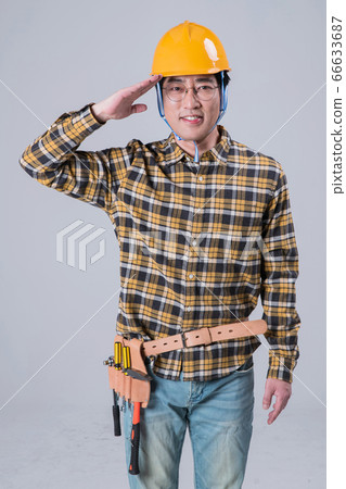 A studio portrait of Asian man making a confident smile 393 A studio portrait of Asian man making a confident smile 393 66633687