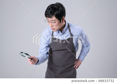 A studio portrait of Asian man making a confident smile 296 A studio portrait of Asian man making a confident smile 296 66633732