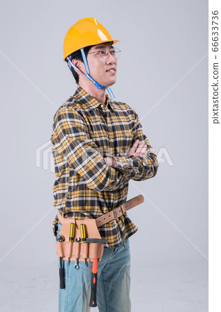 A studio portrait of Asian man making a confident smile 388 A studio portrait of Asian man making a confident smile 388 66633736