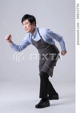 A studio portrait of Asian man making a confident smile 336 66633750