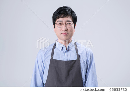 A studio portrait of Asian man making a confident smile 256 A studio portrait of Asian man making a confident smile 256 66633780