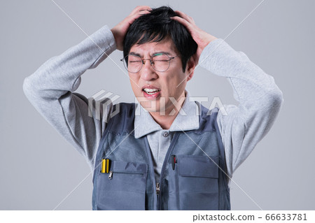 A studio portrait of Asian man making a confident smile 437 66633781