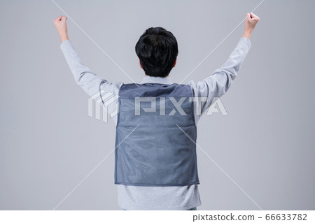 A studio portrait of Asian man making a confident smile 424 A studio portrait of Asian man making a confident smile 424 66633782