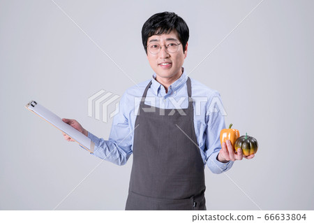 A studio portrait of Asian man making a confident smile 344 A studio portrait of Asian man making a confident smile 344 66633804