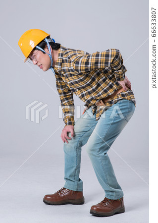 A studio portrait of Asian man making a confident smile 396 A studio portrait of Asian man making a confident smile 396 66633807