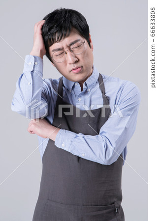 A studio portrait of Asian man making a confident smile 341 A studio portrait of Asian man making a confident smile 341 66633808