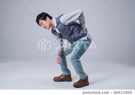 A studio portrait of Asian man making a confident smile 432 A studio portrait of Asian man making a confident smile 432 66633809