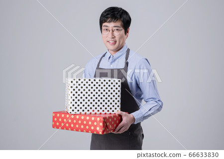 A studio portrait of Asian man making a confident smile 348 A studio portrait of Asian man making a confident smile 348 66633830