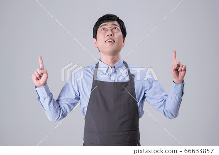 A studio portrait of Asian man making a confident smile 258 A studio portrait of Asian man making a confident smile 258 66633857