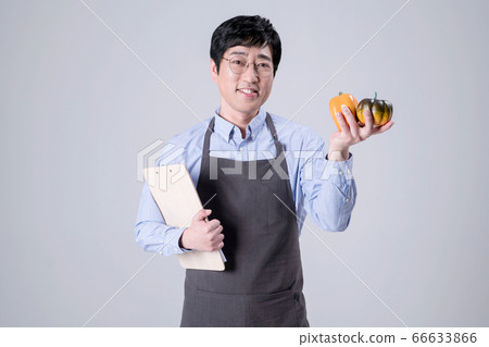 A studio portrait of Asian man making a confident smile 297 A studio portrait of Asian man making a confident smile 297 66633866