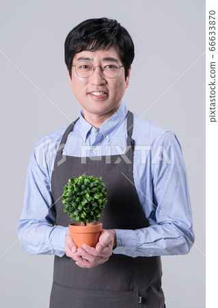 A studio portrait of Asian man making a confident smile 272 A studio portrait of Asian man making a confident smile 272 66633870