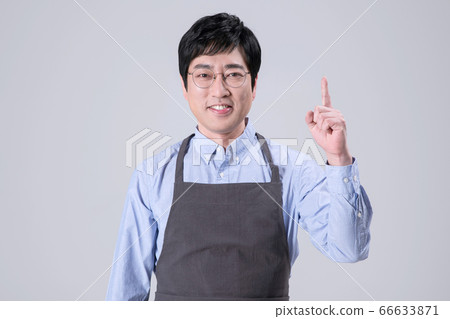 A studio portrait of Asian man making a confident smile 275 A studio portrait of Asian man making a confident smile 275 66633871