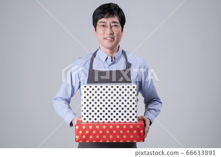 A studio portrait of Asian man making a confident smile 264 A studio portrait of Asian man making a confident smile 264 66633891