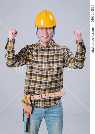 A studio portrait of Asian man making a confident smile 383 A studio portrait of Asian man making a confident smile 383 66633892