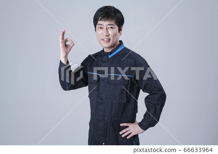 A studio portrait of Asian man making a confident smile 151 A studio portrait of Asian man making a confident smile 151 66633964