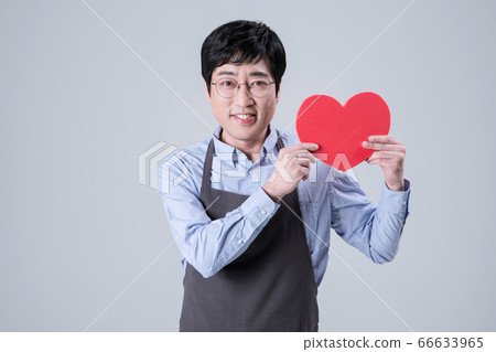 A studio portrait of Asian man making a confident smile 090 A studio portrait of Asian man making a confident smile 090 66633965