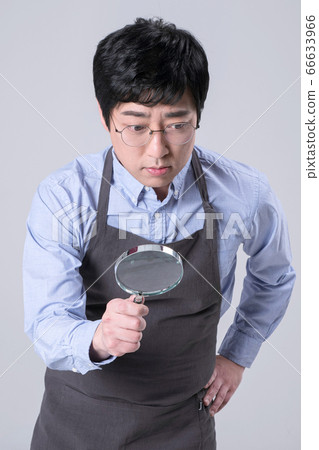 A studio portrait of Asian man making a confident smile 326 A studio portrait of Asian man making a confident smile 326 66633966