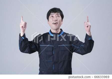 A studio portrait of Asian man making a confident smile 147 A studio portrait of Asian man making a confident smile 147 66633969
