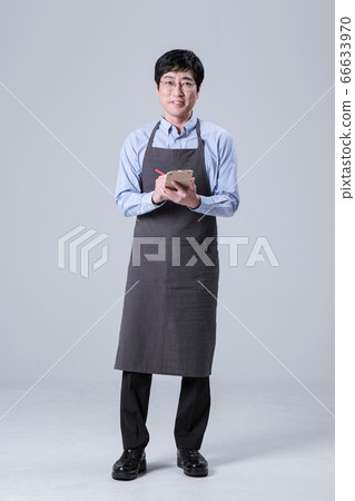 A studio portrait of Asian man making a confident smile 089 A studio portrait of Asian man making a confident smile 089 66633970