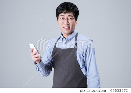 A studio portrait of Asian man making a confident smile 085 A studio portrait of Asian man making a confident smile 085 66633972