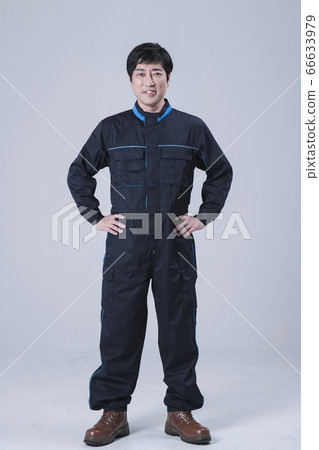 A studio portrait of Asian man making a confident smile 146 A studio portrait of Asian man making a confident smile 146 66633979