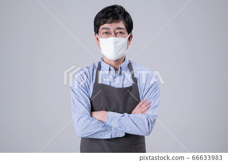 A studio portrait of Asian man making a confident smile 242 A studio portrait of Asian man making a confident smile 242 66633983