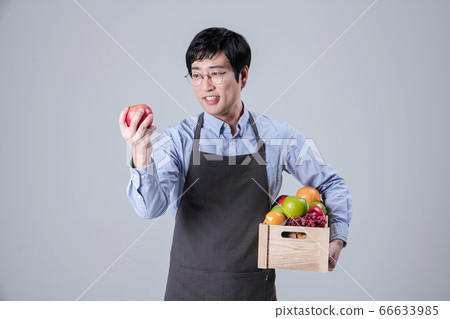 A studio portrait of Asian man making a confident smile 116 66633985