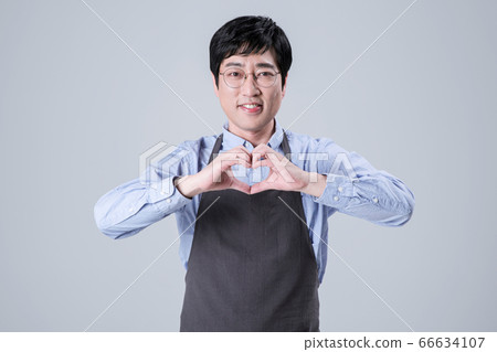 A studio portrait of Asian man making a confident smile 110 A studio portrait of Asian man making a confident smile 110 66634107