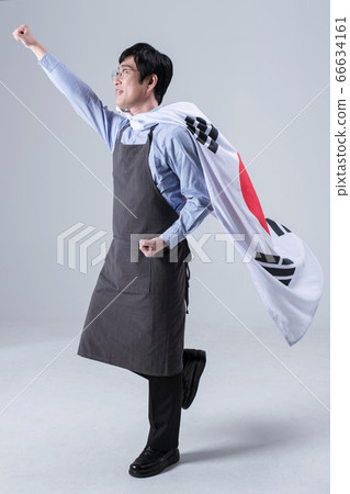 A studio portrait of Asian man making a confident smile 024 66634161