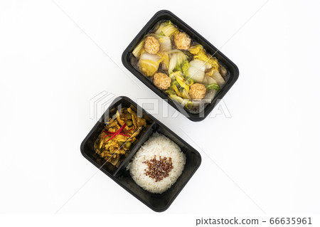 Top view of spicy curry pork with rice and meat ball vegetable soup in black contain box. Top view of spicy curry pork with rice and meat ball vegetable soup in black contain box. 66635961