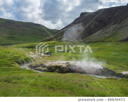 Reykjadalur valley with hot springs river and pool 66636453