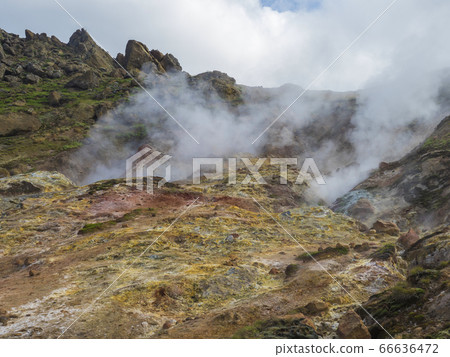 Colorful rhyolit red, orange and yellow fumarole Colorful rhyolit red, orange and yellow fumarole 66636472
