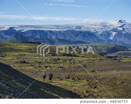 Couple of two young hikers at Laugavegur hiking Couple of two young hikers at Laugavegur hiking 66636755